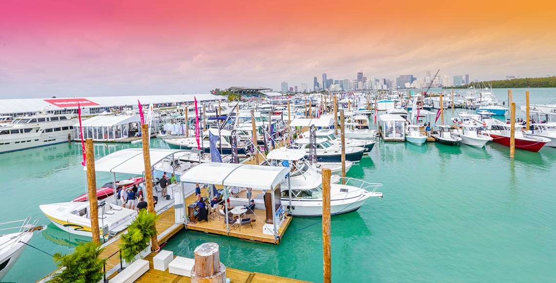 Miami International Boat Show with City of Miami in Background with Pink Sky