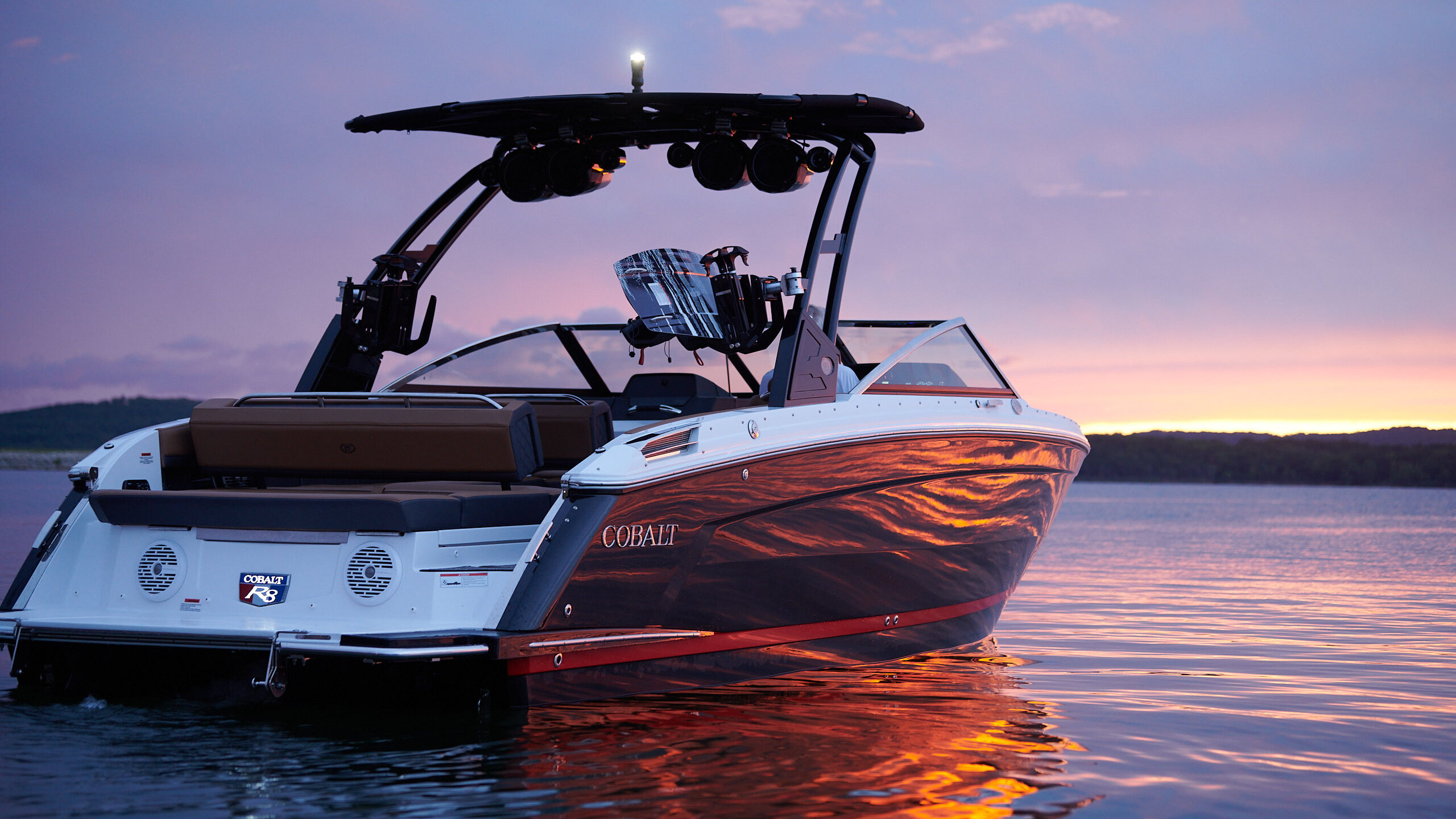 Cobalt R8 hull side at sunset.