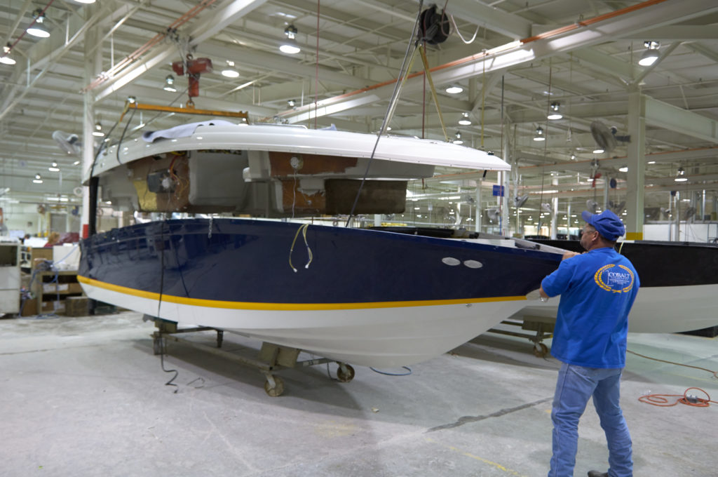 Person inspecting a Cobalt boat